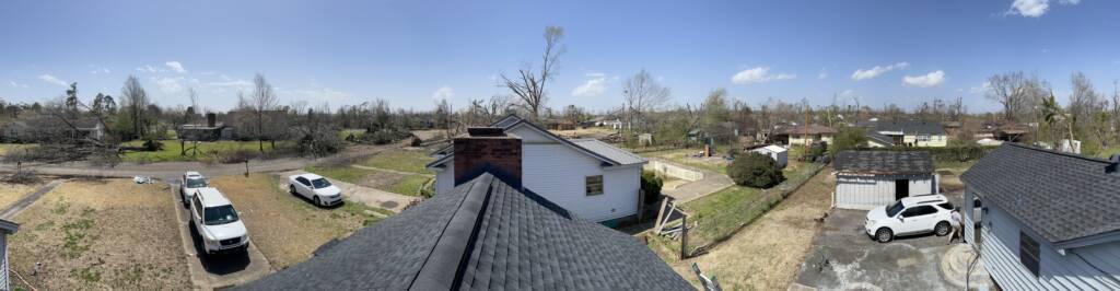 picture of houses, cars, and trees