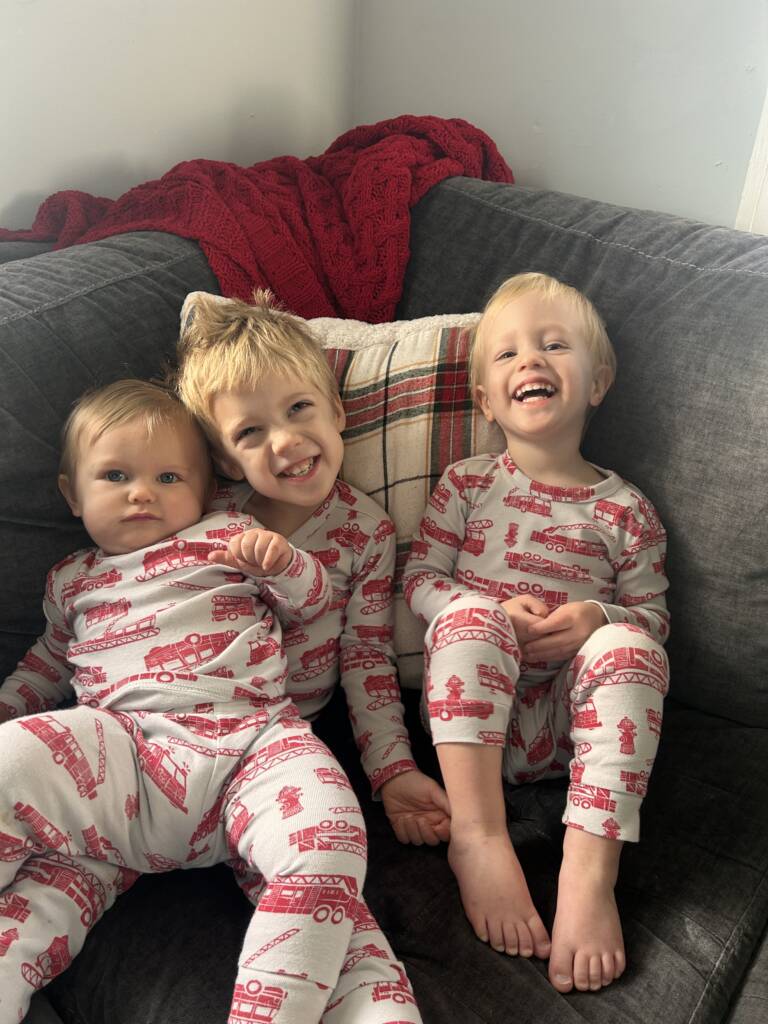 children sitting on couch