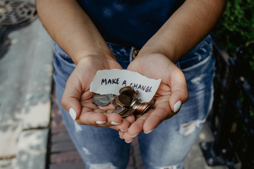 picture of hands holding coins